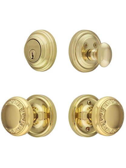 Classic Rosette Entry Set, Keyed Alike with Ovolo Knobs in Un-Lacquered Brass.